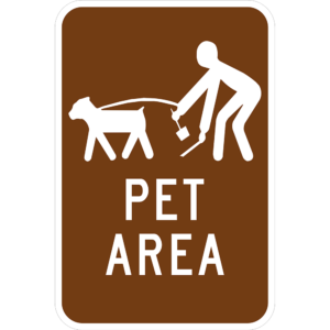 rectangular sign with white trim that reads "Pet Area" and has an image of a character walking dog and picking up the dogs poop.