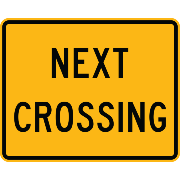 Yellow rectangular Next Crossing Plaque Sign