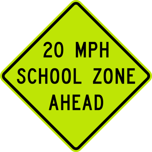 Lime green school zone sign